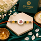 Money Magnet OM Rakhi – Green Jade, Citrine, Pyrite & Mother of Pearl Rakhi for Prosperity, Protection & Positive Energy