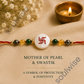 Money Magnet Swastik Rakhi – Green Jade, Citrine, Pyrite & Mother of Pearl Rakhi for Prosperity, Protection & Positive Energy